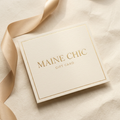 Maine Chic gold-and-ivory branded gift card